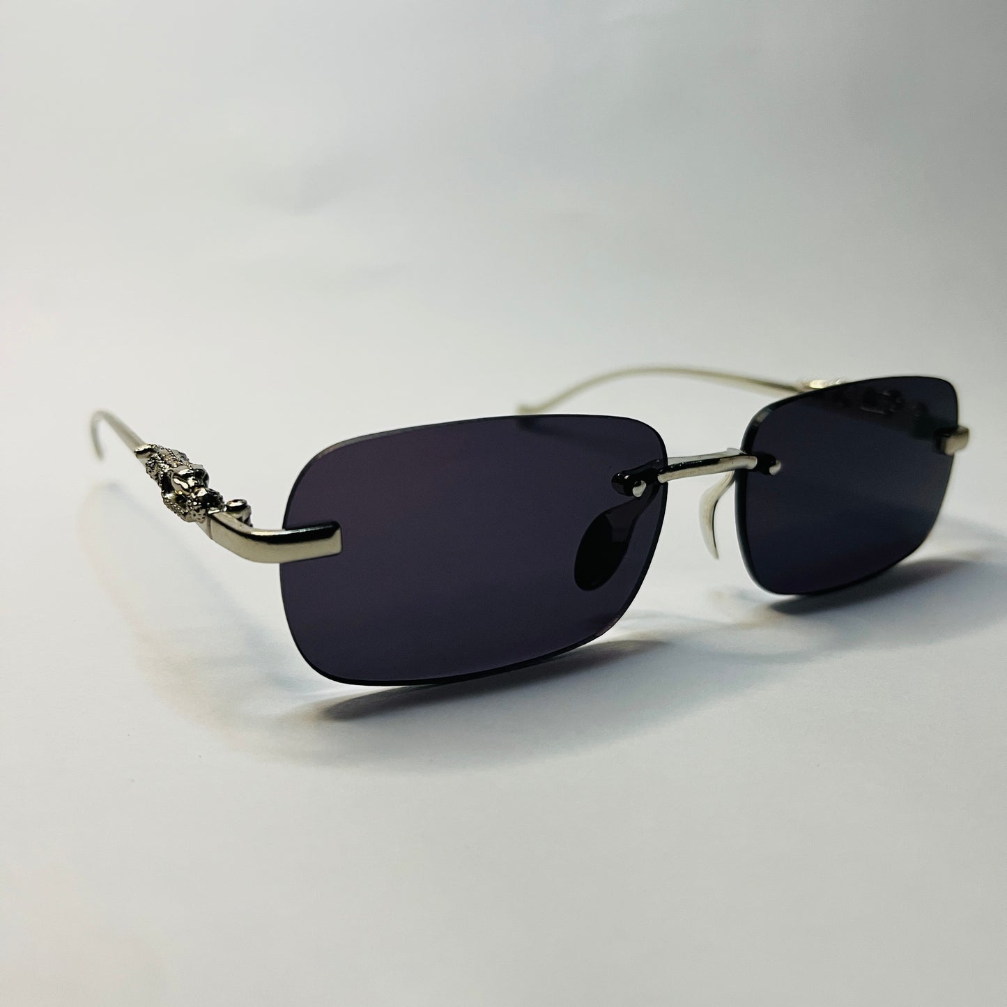 Elite Silver Rimless Panther Sunglasses